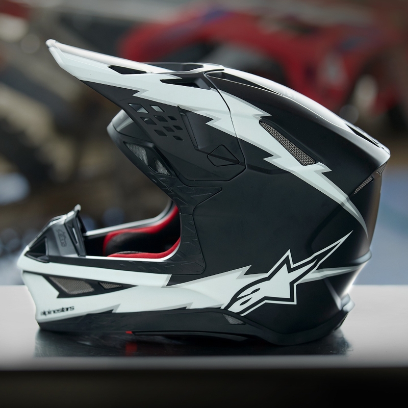 Motocross-Helm Alpinestars Supertech S-M10 Ampress mattschwarz-weiß
