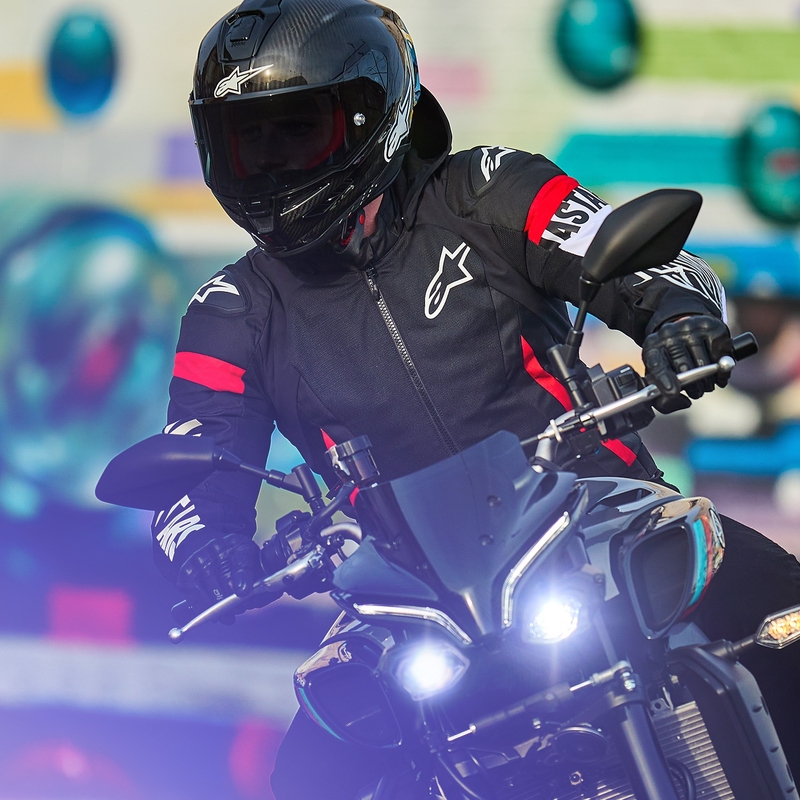 Alpinestars Zaca Air Waterproof Motorradjacke schwarz-weiß-fluoreszierend rot
