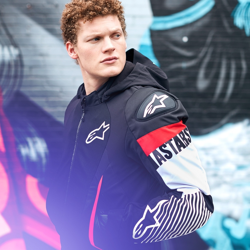 Alpinestars Zaca Air Waterproof Motorradjacke schwarz-weiß-fluoreszierend rot
